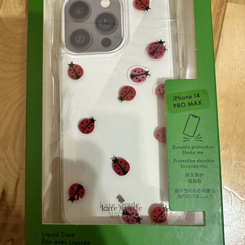 Kate Spade White and Red Ladybug iPhone 14 Pro Max Case